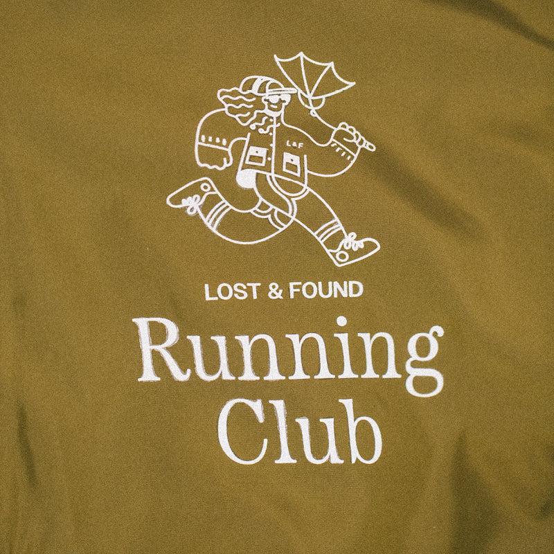 
                  
                    Running Club Rain Jacket
                  
                