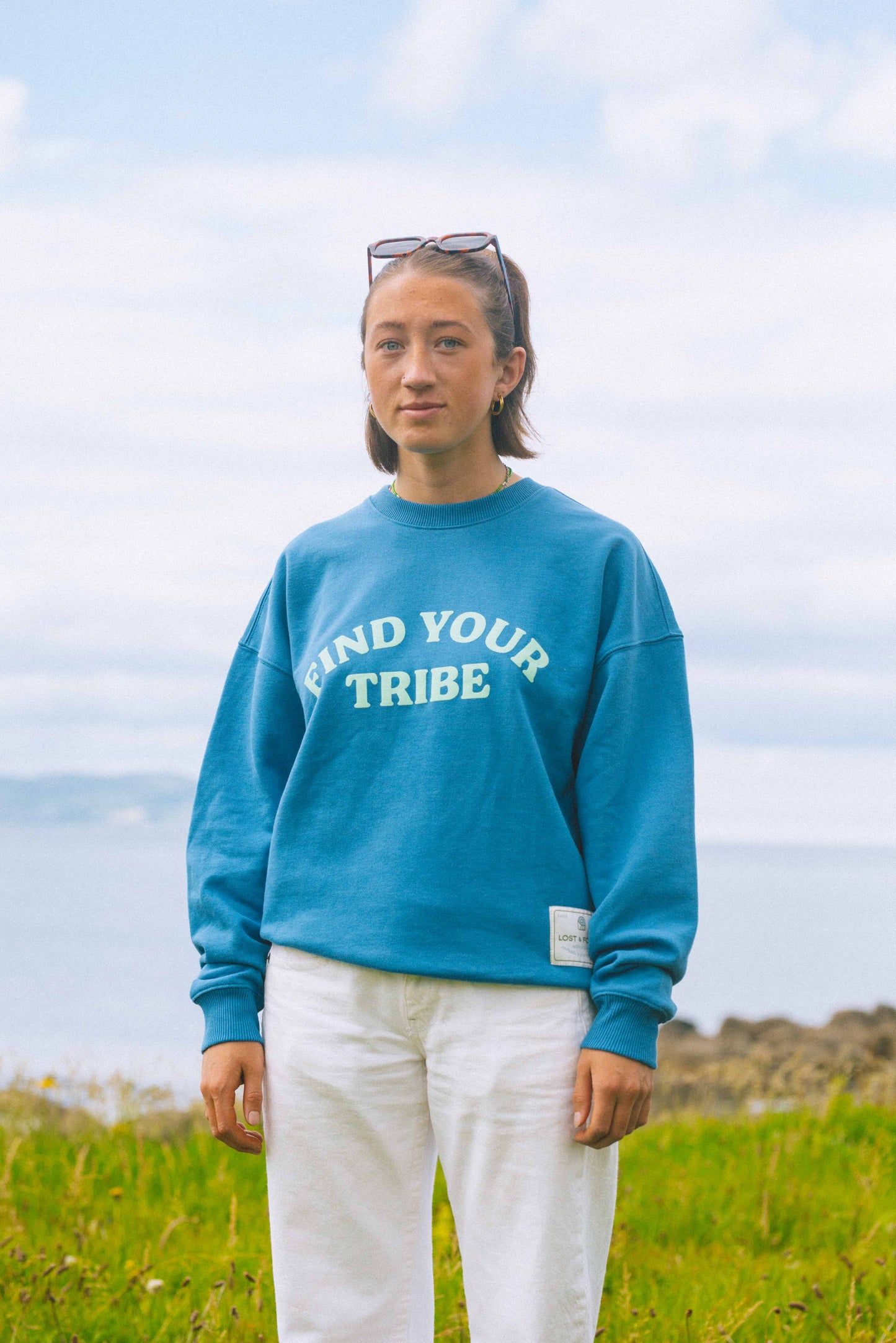 
                  
                    "Find Your Tribe" Sweatshirt
                  
                