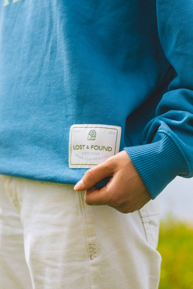 
                  
                    "Find Your Tribe" Sweatshirt
                  
                